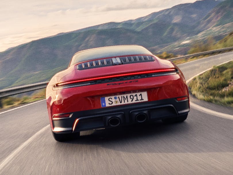New Porsche 911 Targa 4 GTS (992.2) on twisty road